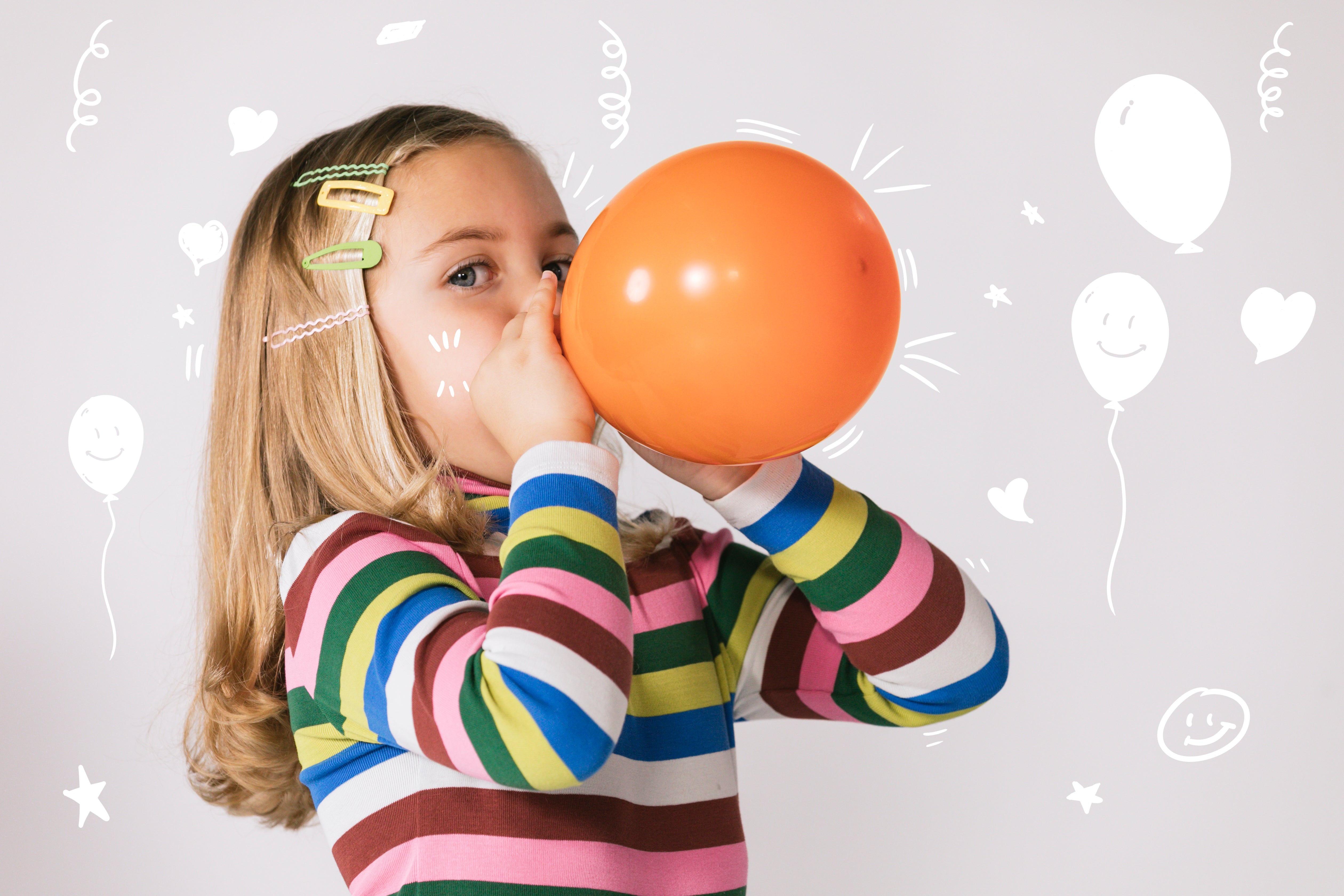 Kid inflating ballon